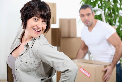Moving team loading belongings for flat removals in Stpaulscray